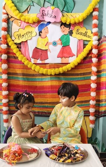 Raksha Bandhan: Tying rakhi with love